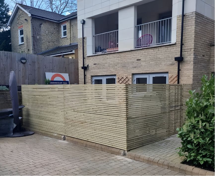 Newly built slatted timber fence and screen
